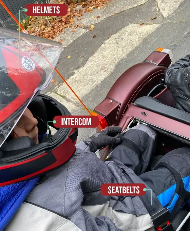 Sidecar equipment photograph labelled helmets, intercom and seatbelts